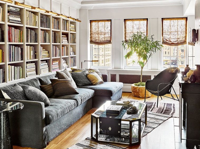 A living room with a couch and chair