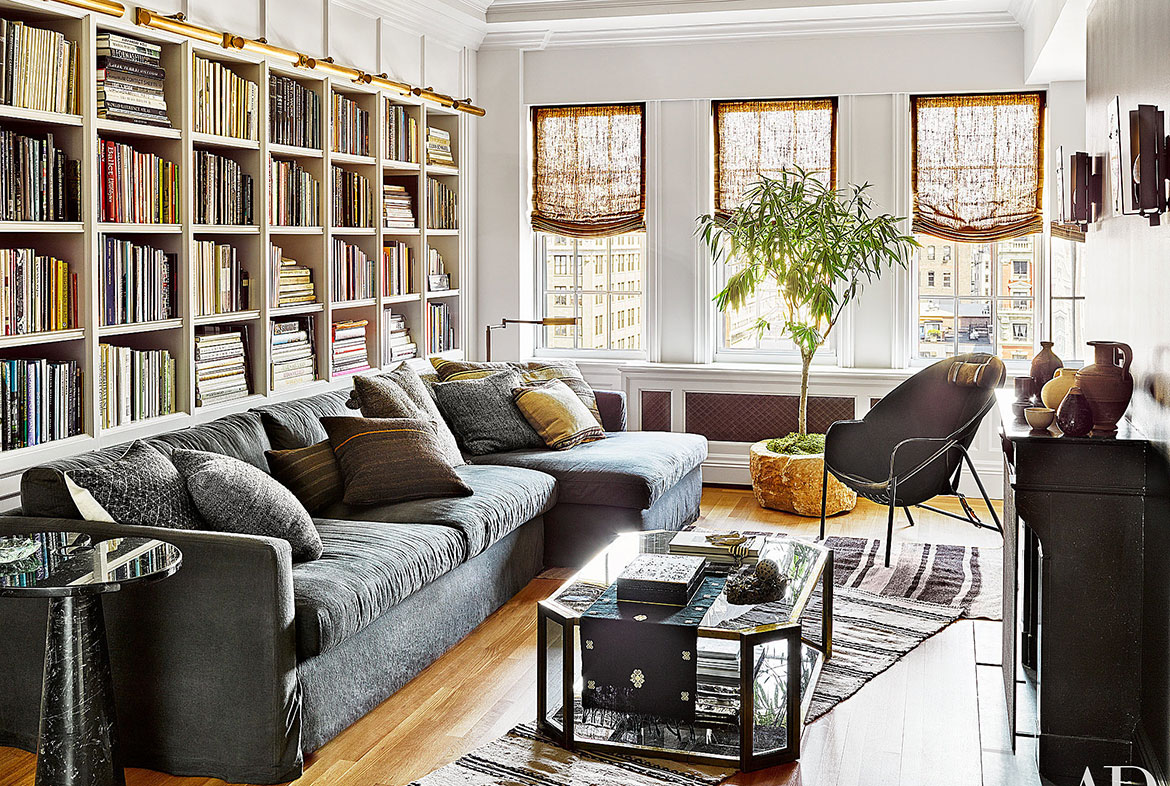 A living room with a couch and chair